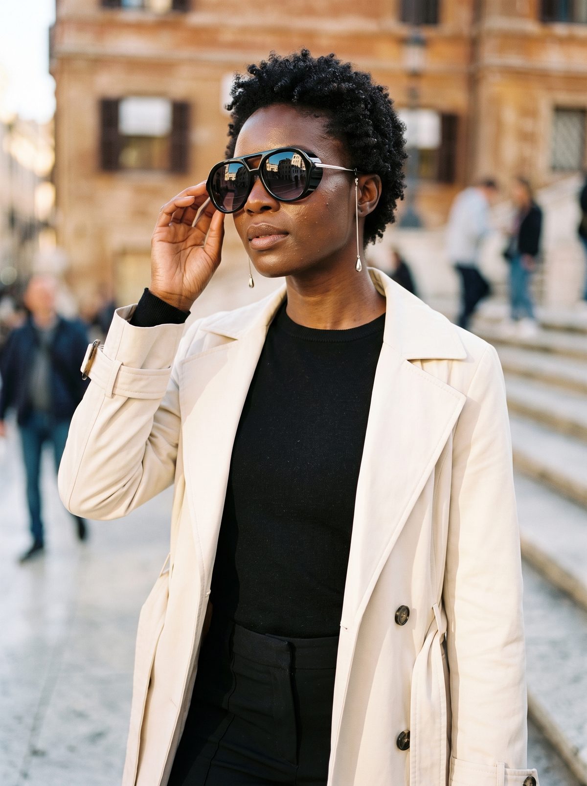 Woman on the Spanish Steps in Rome wearing RIVA sunglasses